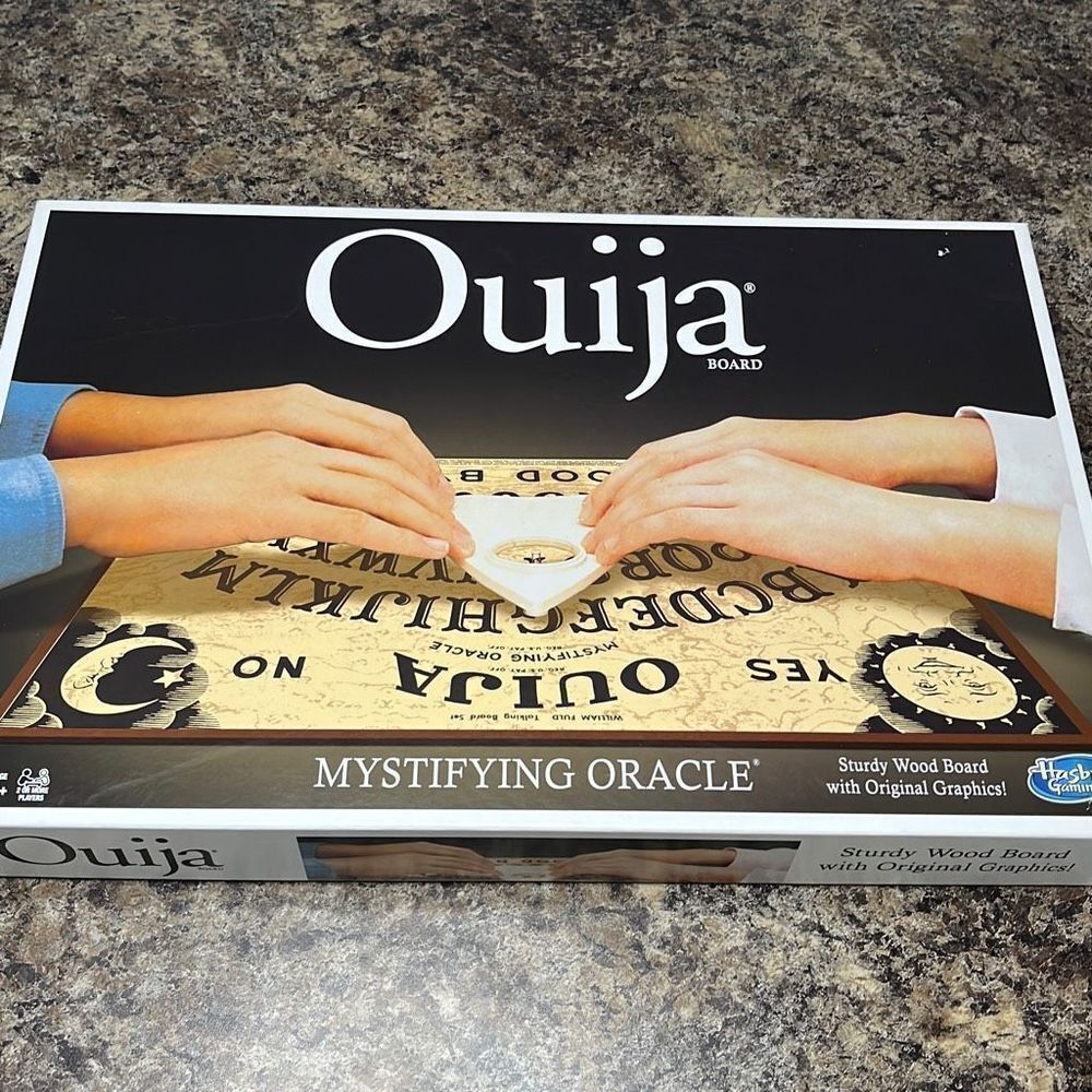 Ouija 2017 edition Open box but gem mint condition, make family game night fun
